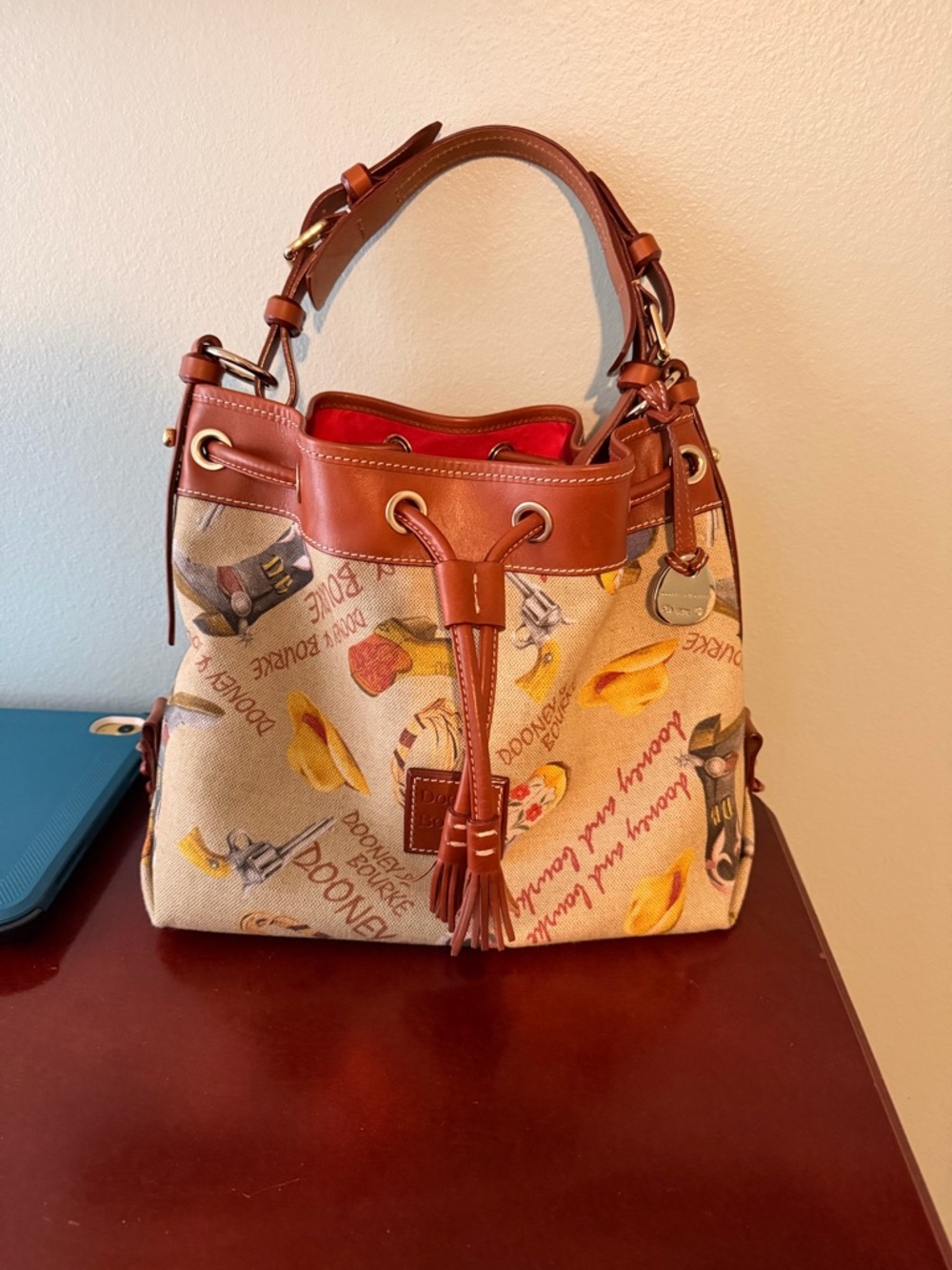 Dooney & Bourke Tan Canvas Floral-Print Leather-Trim Drawstring Bucket Bag
